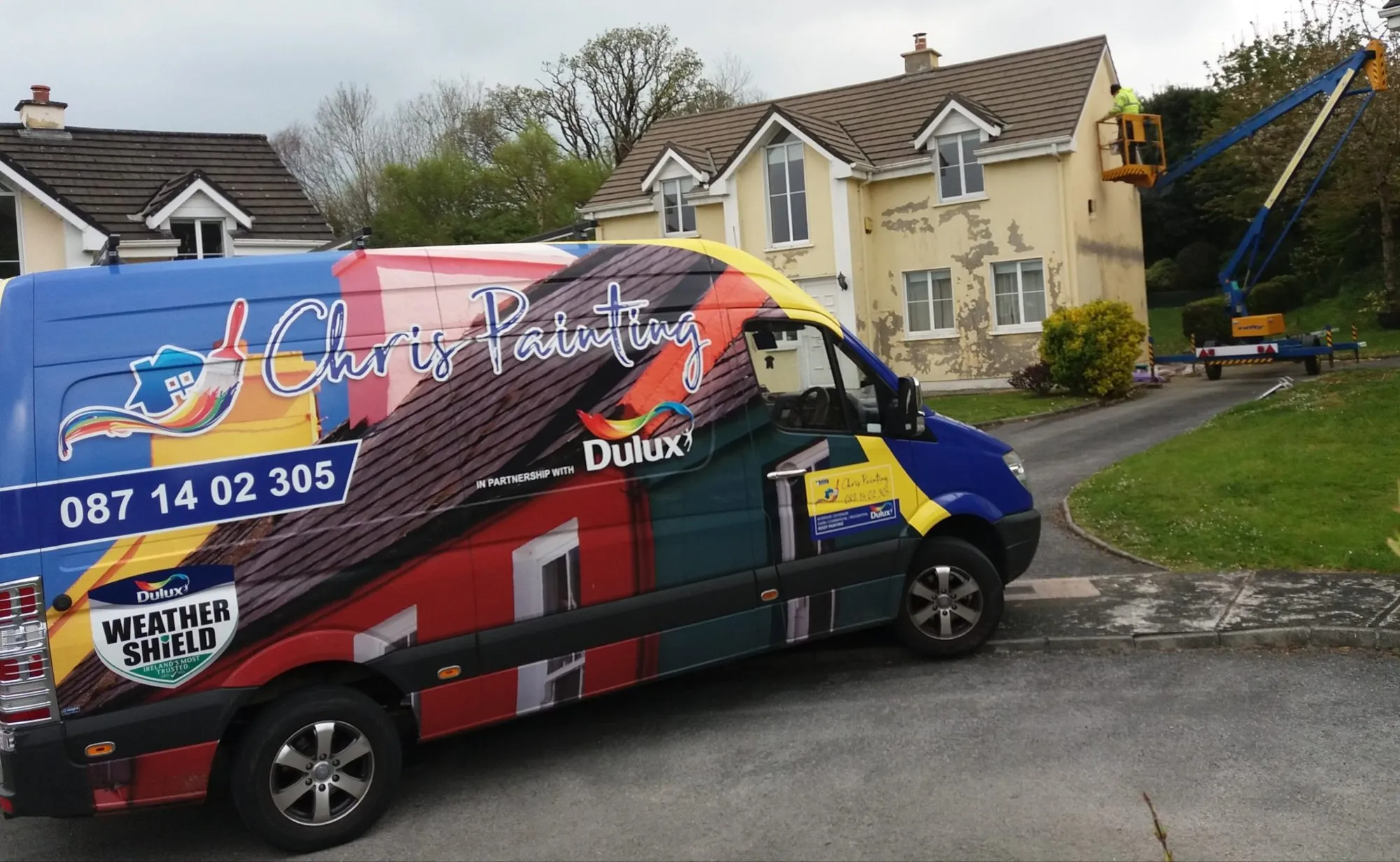 The Chris Painting van and lift at a job